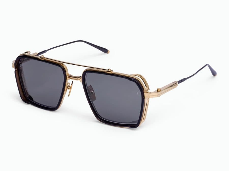 Gold and navy navigator frame with grey lenses and side shields